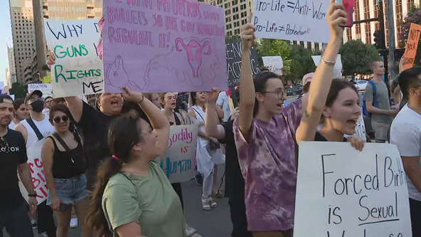 Women's rights advocates converge in Downtown Dallas to protest Roe V. Wade ruling