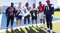Members of U.S. World Cup squad stop by Dallas Cowboys practice