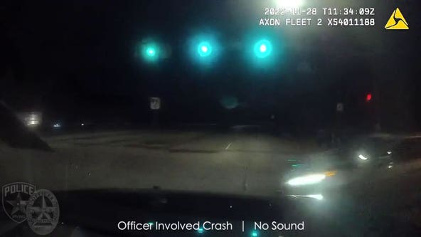 VIDEO: Irving police officer crashes into car that ran red light
