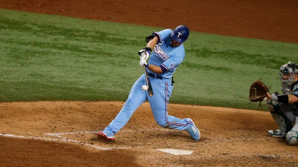 Rangers keep rolling in 12-3 rout of Mariners