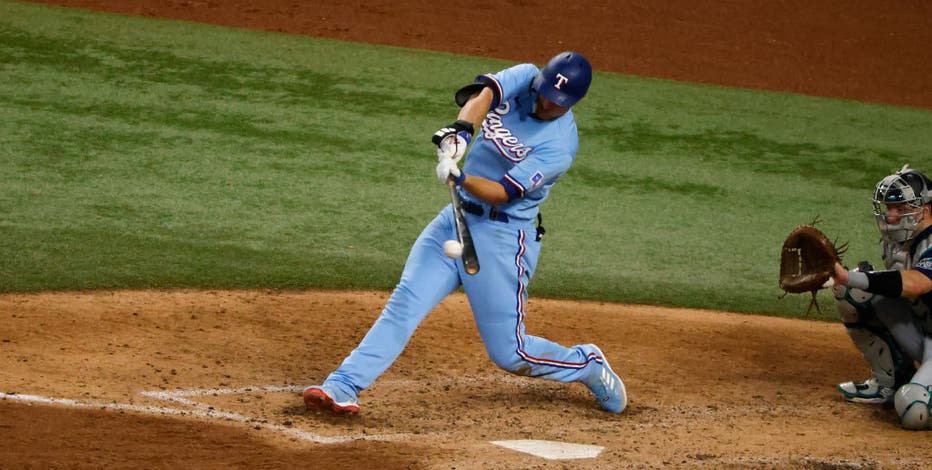 Rangers keep rolling in 12-3 rout of Mariners