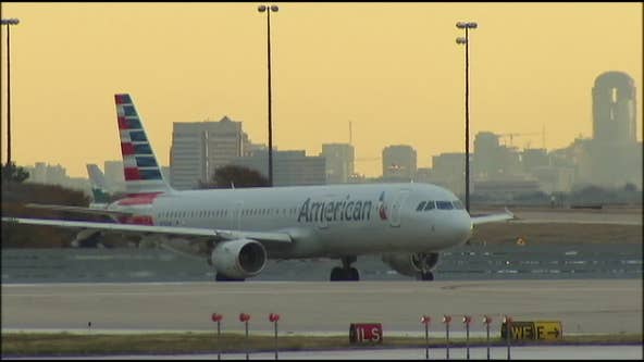 American Airlines raises checked luggage fees