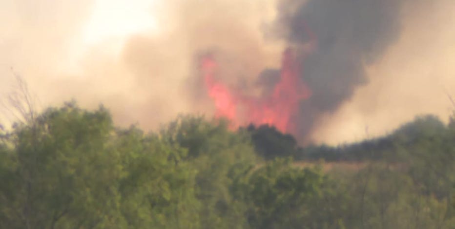 Crews battling large fire in Johnson County