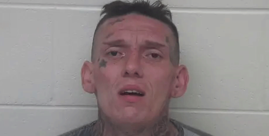 Half-naked squatter with face tattoos tries to drown deputy during bizarre chase: cops