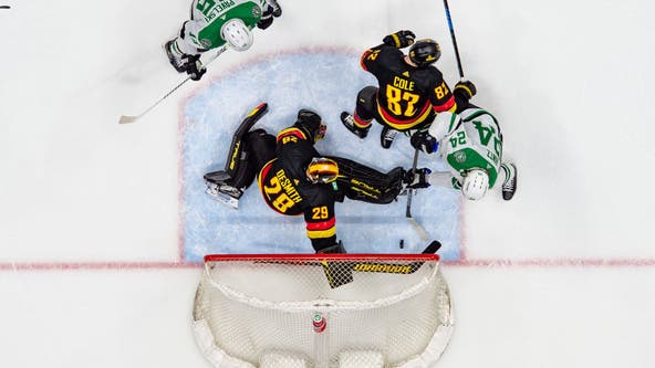 West-leading Stars wrap up playoff spot, beating Canucks 3-1 for 6th straight victory