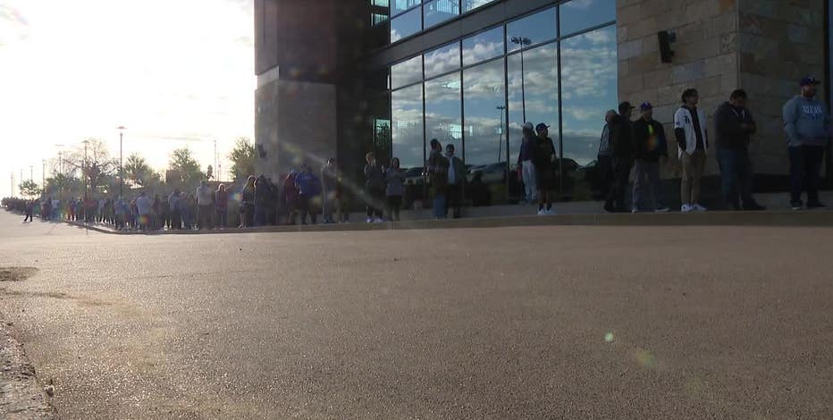 Texas Rangers fans line up outside Globe Life Field overnight for gold championship gear