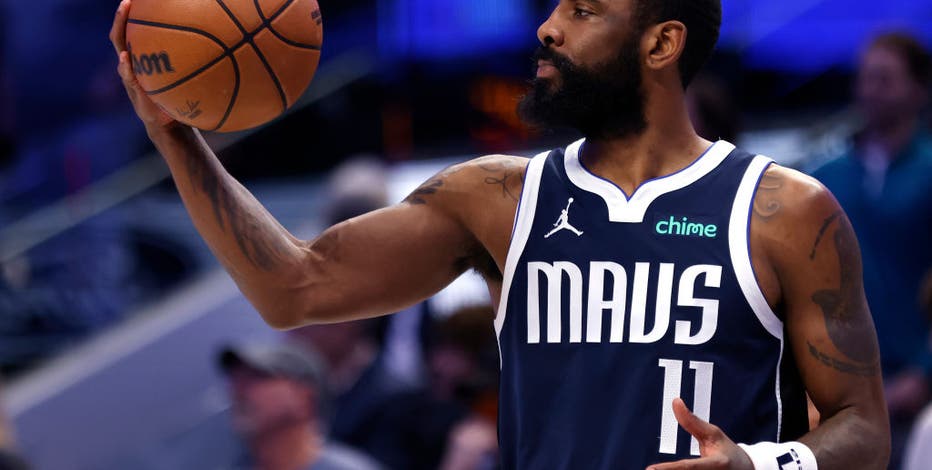 Kyrie Irving's running left-hander at the buzzer lifts Mavs over Nuggets 107-105