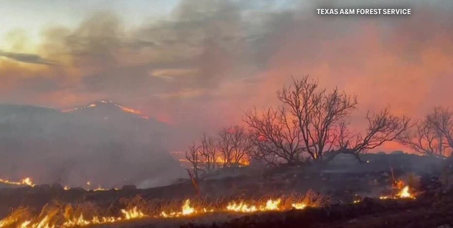 Firefighters face difficult weather conditions as they battle largest wildfire in Texas history