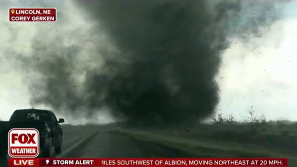 Watch: Tornado crosses Iowa interstate on live TV