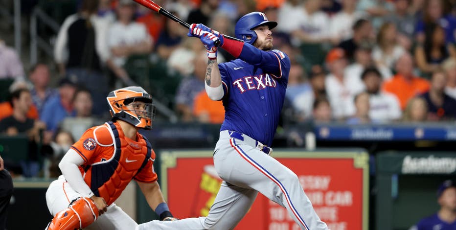 Heim homers with 4 RBIs as Rangers win 12-8 and drop Astros to 4-11