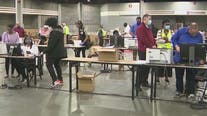 Georgia election workers reach settlement terms with OAN