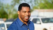 Herschel Walker targeted in campaign ad using ex-wife’s accusations: ‘He was gonna blow my brains out’