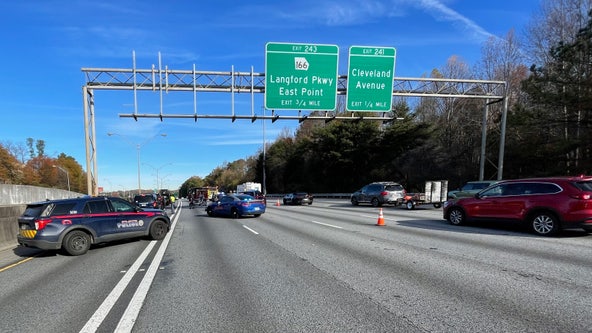 Atlanta officer struck while driving motorcycle on I-75, police say