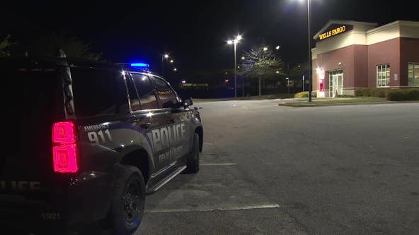 DeKalb County bank's door damaged in shooting