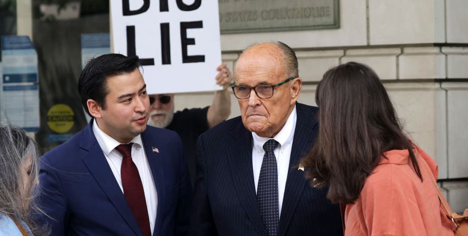 Who are the 19 people indicted in Fulton County's election interference case?