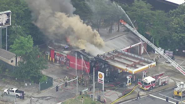 Motorcycle fire spreads to gas station on Northside Drive NW near I-75 in Atlanta