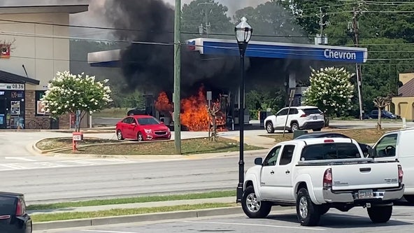Car bursts in flames at DeKalb County gas station