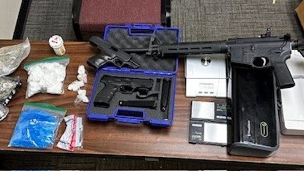 2 arrested after drugs, guns found in Henry County bust, police say