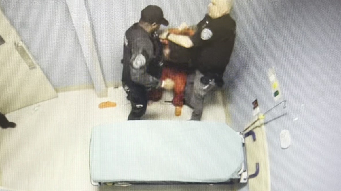 Cuffed, shacked Cobb County inmate punched and choked by deputy