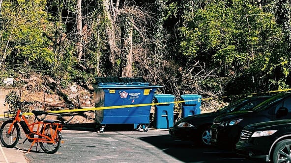 Police investigating body found in trash container in Southeast