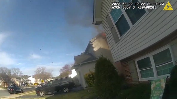 WATCH: Anne Arundel County officer helps residents escape house fire