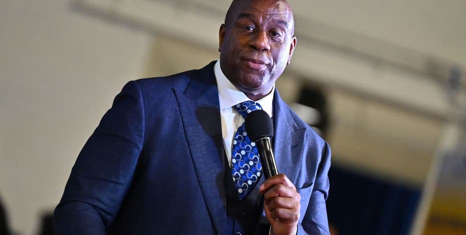 Magic Johnson joins Josh Harris’ bid for Commanders: AP source
