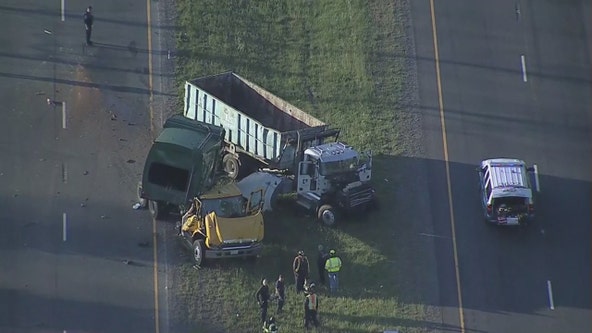 Garbage truck collides with truck hauling dumpster causing delays in Manassas