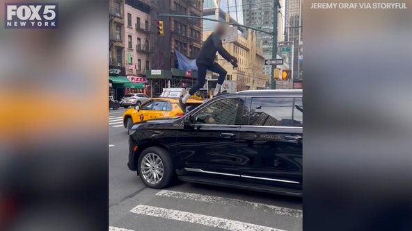 NYC carjacking: Man crashes stolen car into taxi, climbs onto moving SUV before arrest | VIDEO
