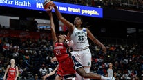 Jonquel Jones scores 25 to help the Liberty open the season with an 85-80 victory over the Mystics