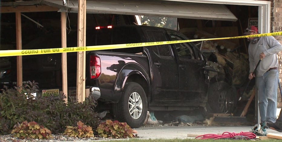 Pickup truck slams into house, driver sustains minor injuries