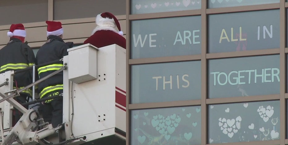 Santa, fire departments surprise kids at Children's Wisconsin