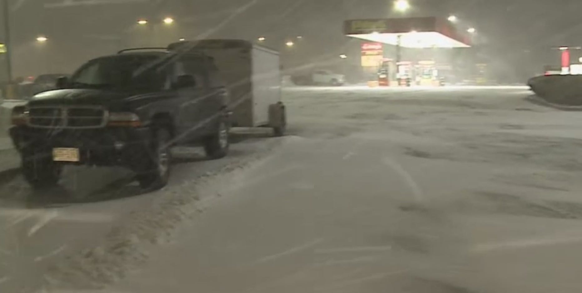 Moderate to heavy snow ongoing, wind gusts lead to blowing, drifting snow