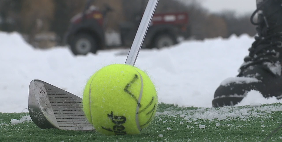 FORE! Golfers hit the icy links to raise money for first responders