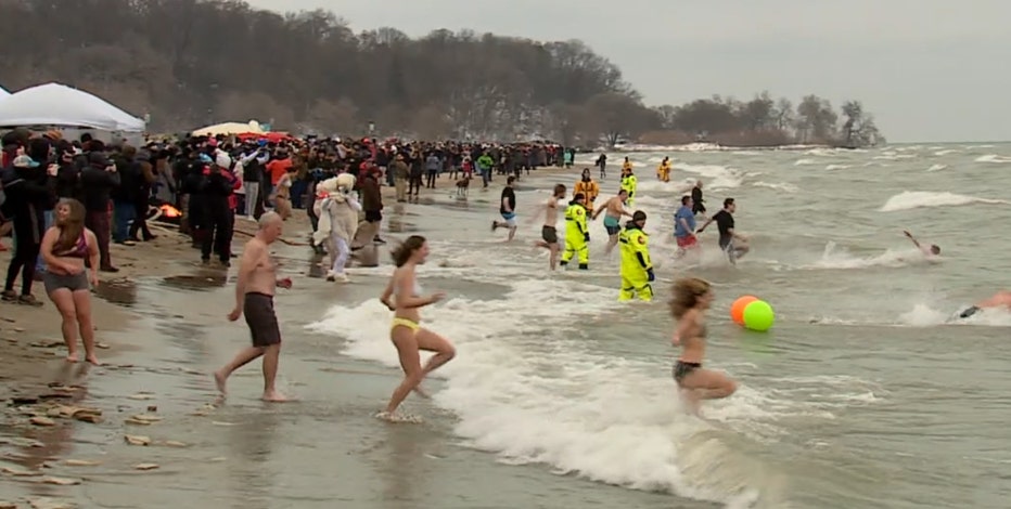 Tradition stands: Polar bear plungers take Bradford Beach by storm
