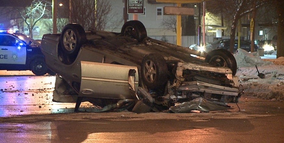 Driver loses control of car, strikes sign before rolling over