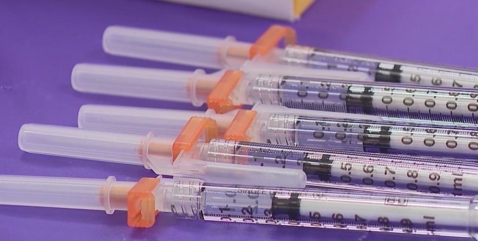 Pharmacies juggle COVID-19 vaccinations plus regular workload