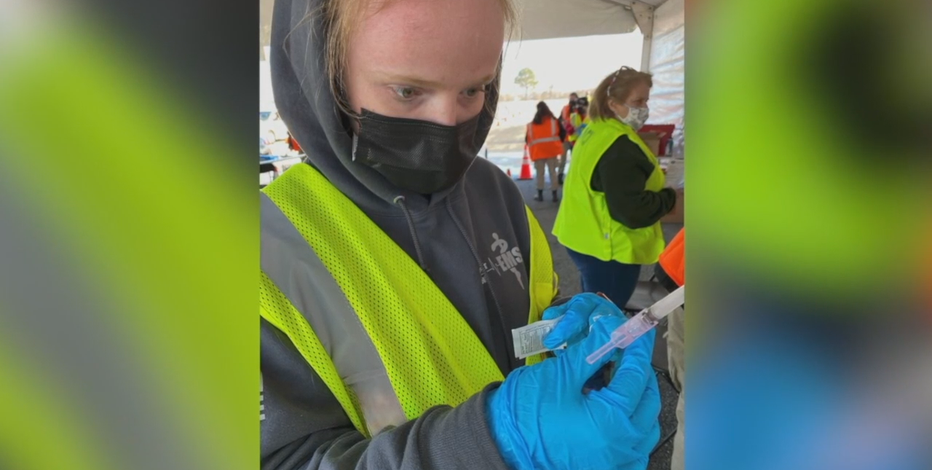 Meet the people behind the masks at vaccine site in Milwaukee