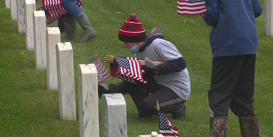 Memorial Day: Students place flags at Wood National Cemetery