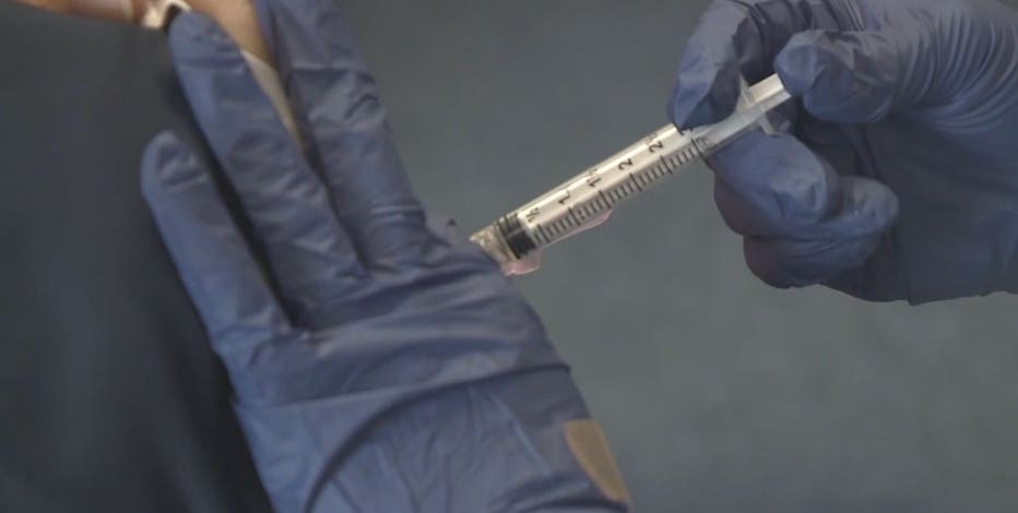 Omicron COVID variant, UW Health urges vaccine