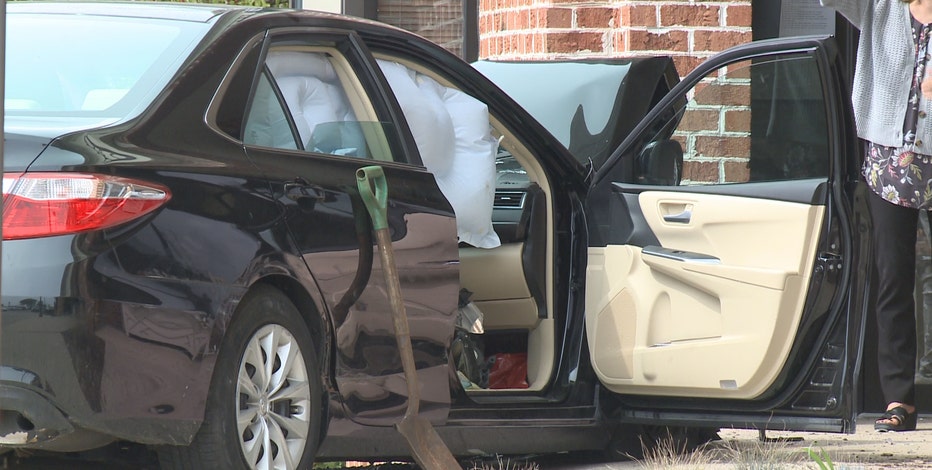 Mequon car crash into building; driver injured, cited