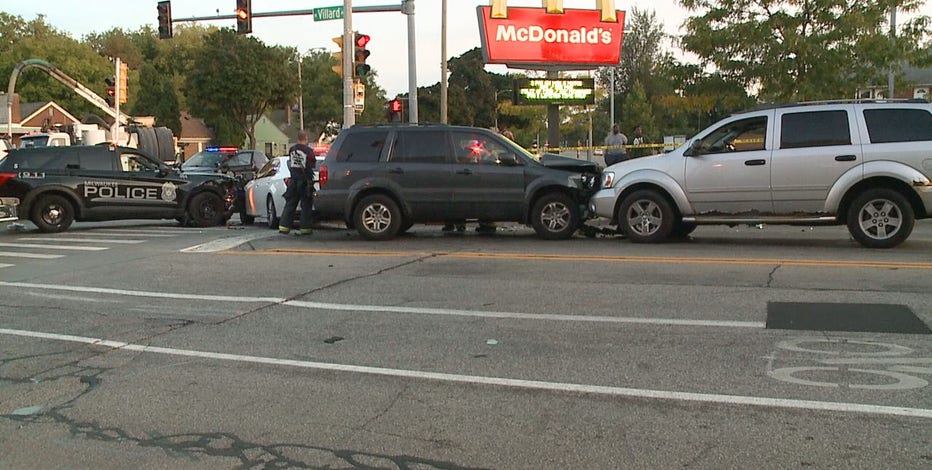 Milwaukee police car hit near Teutonia and Villard