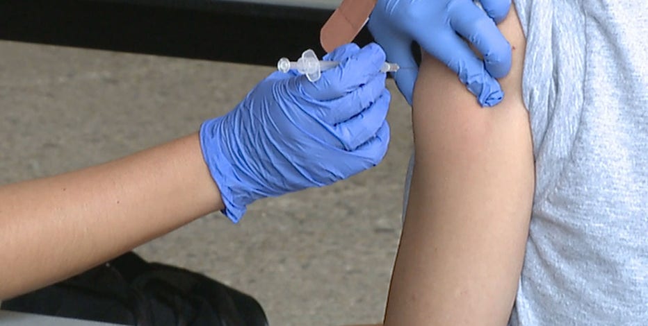 Omicron variant in Milwaukee County man, vaccines pushed