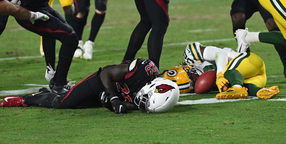 Packers, Cardinals players involved in vicious collision, leave field on carts