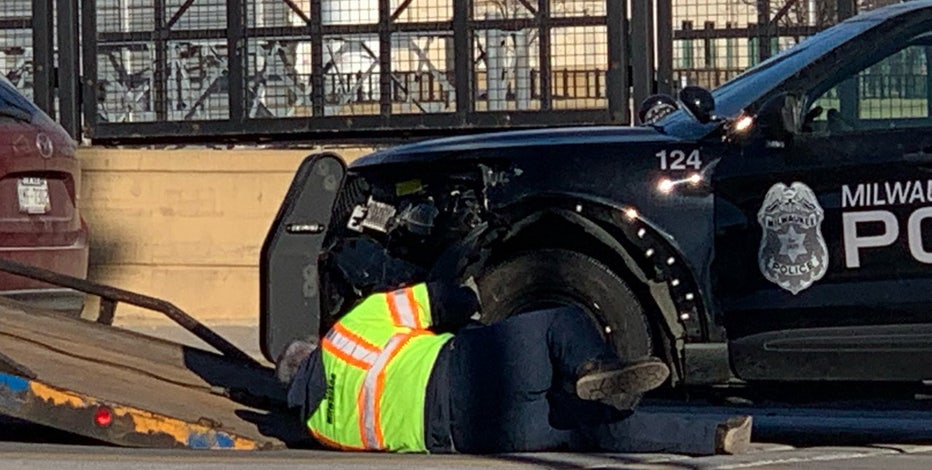 Milwaukee police car hit, officer injured near 10th and Wells
