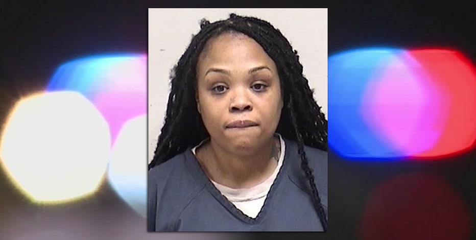 Kenosha woman allegedly pointed gun at man in school parking lot