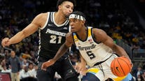 Marquette holds off Providence, 83-75