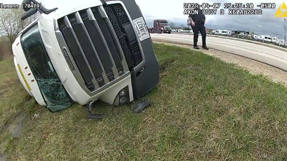 Washington County semi rollover; driver arrested for OWI