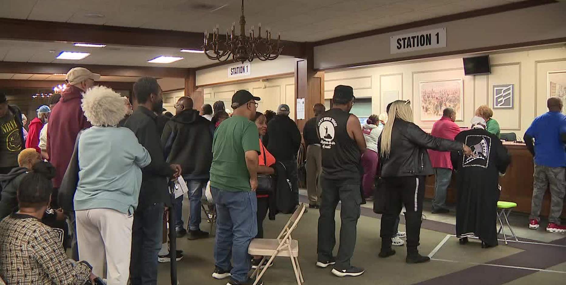 Wisconsin early in-person voting kicks off with delays due to high voter turnout