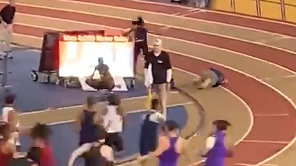 WATCH: Track team sets record despite runner, official colliding during race