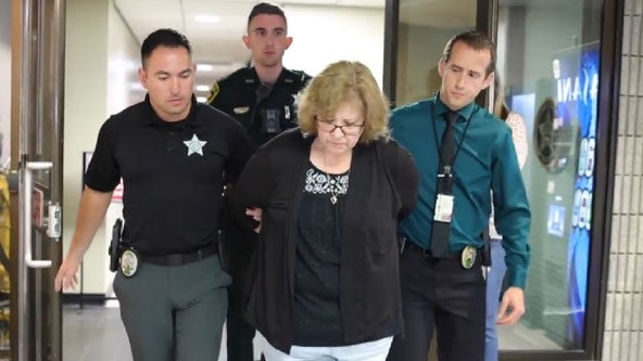 Florida woman who shot, killed neighbor through door arrested, sheriff says